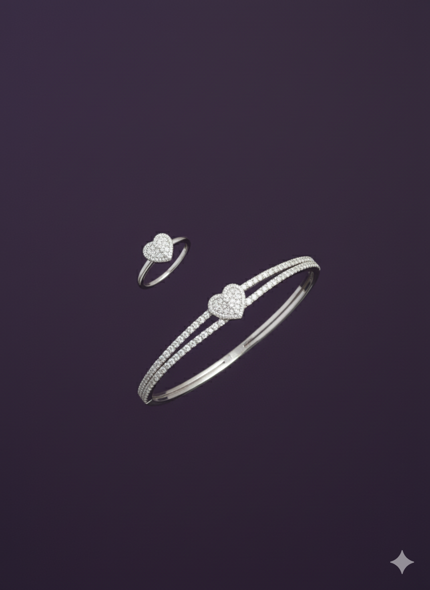 Zircon Studded Heart Shaped Ring And Bracelet. Silver Rhodium Plated.