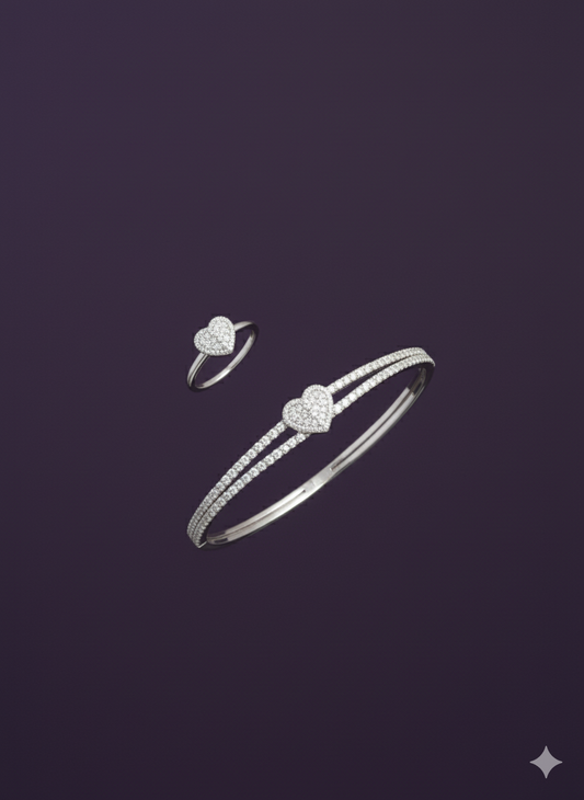 Zircon Studded Heart Shaped Ring And Bracelet. Silver Rhodium Plated.