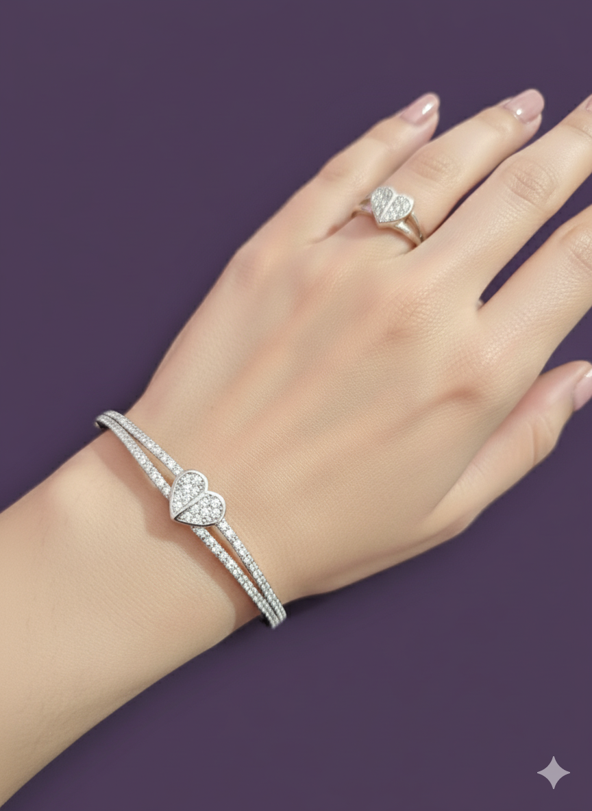 Zircon Studded Heart Shaped Ring And Bracelet. Silver Rhodium Plated.